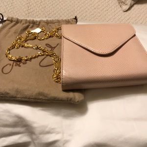 Small pink leather bag with gold chain